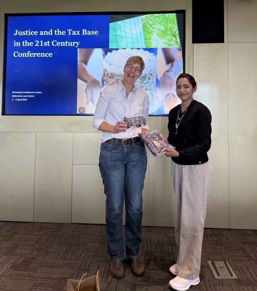 Sajal (right) with Professor Miranda Stewart (left), Director of the Tax Group at Melbourne Law School, photographed during the Justice and the Tax Base in the 21st Century conference.