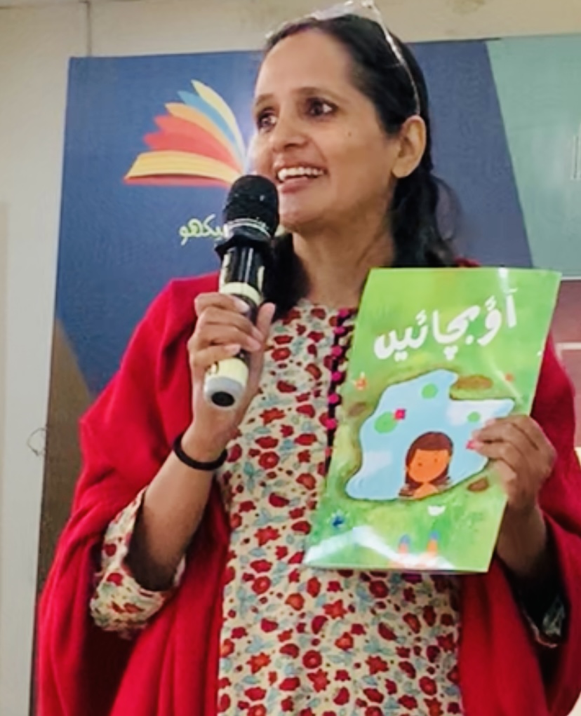 Ansa launching her children's book 'Aao Bachayen' at the 2025 Reading and Learning Festival in Islamabad.