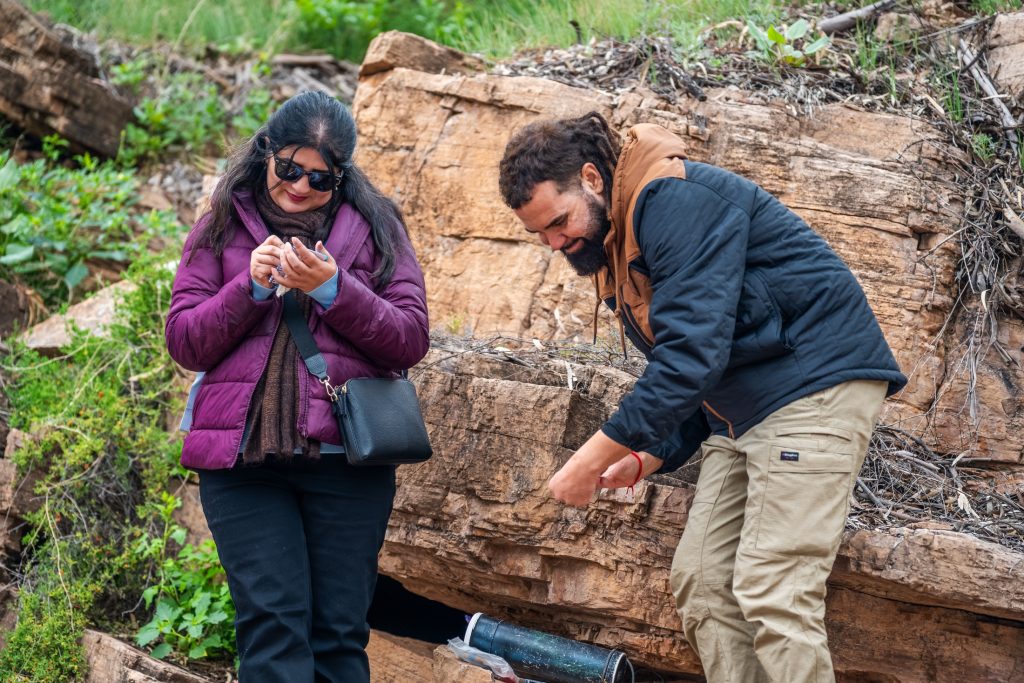 Shamsa (left) interacting with guide John (right) during the study tour at Ikara-Flinders Ranges National Park.